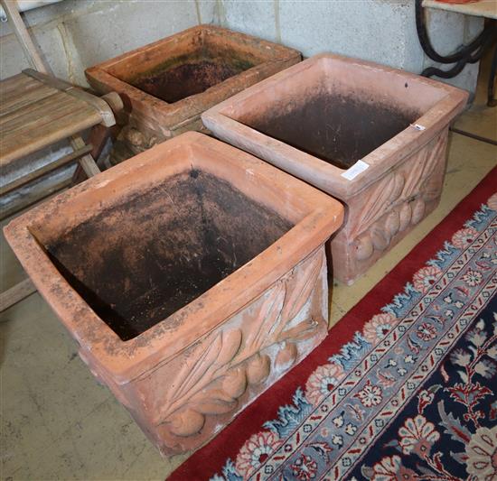 Three terracotta square garden planters, width approx. 44cm, depth approx 44cm, height approx. 31cm